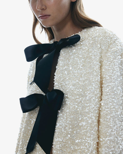 Sequined bow-front jacket